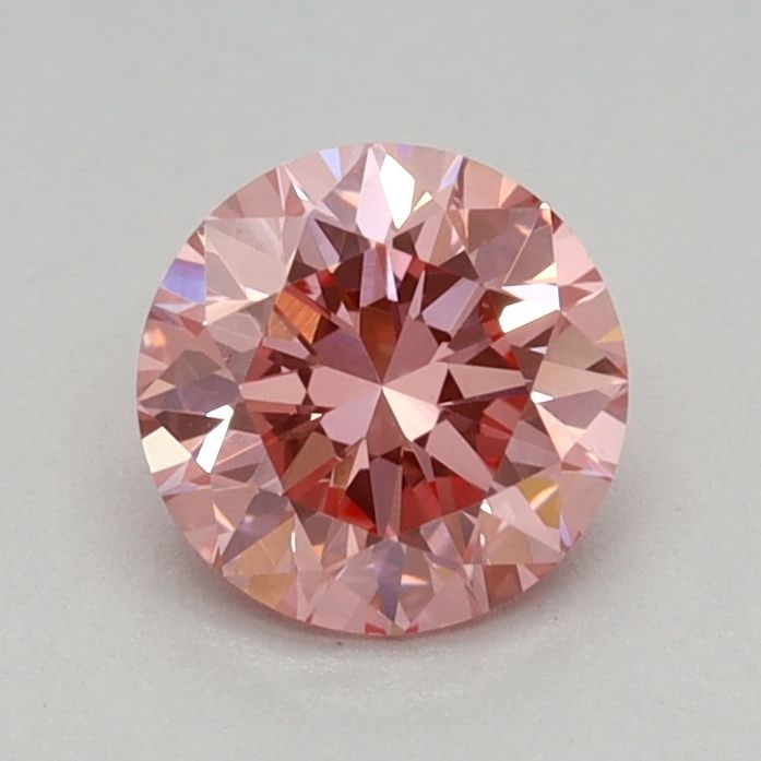 Loose Diamond - ROUND 0.43ct Fancy Vivid Pink VVS2: Loose Diamond - ROUND 0.43ct Fancy Vivid Pink VVS2 Source: This is a real non-mined Diamond that has been grown in a lab Shape: ROUND Carats: 0.43 Color: Fancy Vivid Pink Certification: IGI Video: