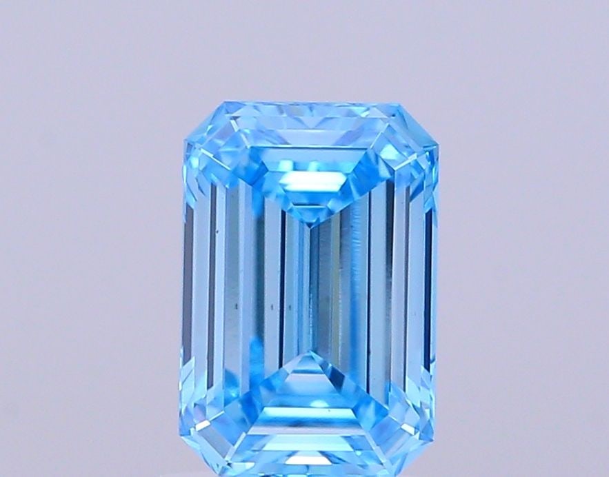 Loose Diamond - EMERALD 1.76ct Fancy Vivid Blue VS2: Loose Diamond - EMERALD 1.76ct Fancy Vivid Blue VS2 Source: This is a real non-mined Diamond that has been grown in a lab Shape: EMERALD Carats: 1.76 Color: Fancy Vivid Blue Certification: IGI Video: