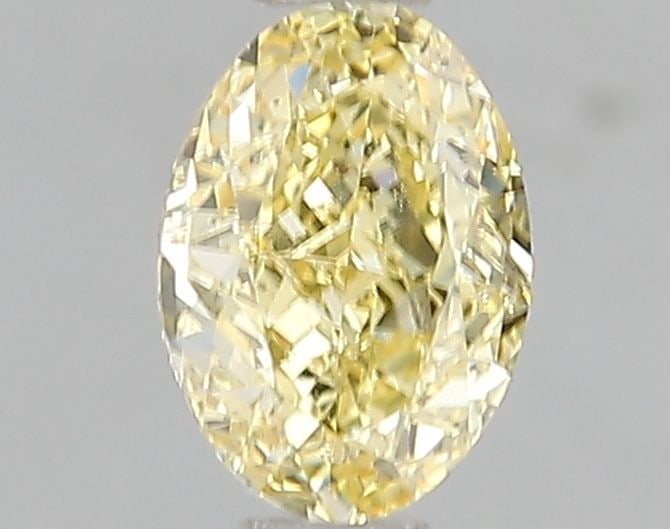 Loose Diamond - OVAL 1.01ct Fancy Intense Yellow VS1: Loose Diamond - OVAL 1.01ct Fancy Intense Yellow VS1 Source: This is a real non-mined Diamond that has been grown in a lab Shape: OVAL Carats: 1.01 Color: Fancy Intense Yellow Certification: IGI Video