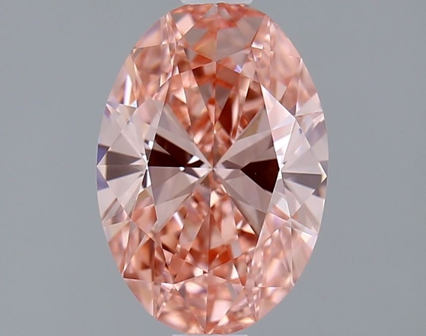 Loose Diamond - OVAL 0.98ct Fancy Vivid Pink VVS2: Loose Diamond - OVAL 0.98ct Fancy Vivid Pink VVS2 Source: This is a real non-mined Diamond that has been grown in a lab Shape: OVAL Carats: 0.98 Color: Fancy Vivid Pink Certification: IGI Video: