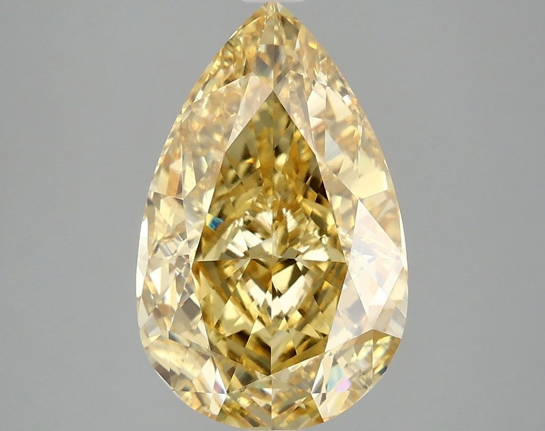 Loose Diamond - PEAR 4.09ct Fancy Vivid Yellow VVS2: Loose Diamond - PEAR 4.09ct Fancy Vivid Yellow VVS2 Source: This is a real non-mined Diamond that has been grown in a lab Shape: PEAR Carats: 4.09 Color: Fancy Vivid Yellow Certification: IGI Video: