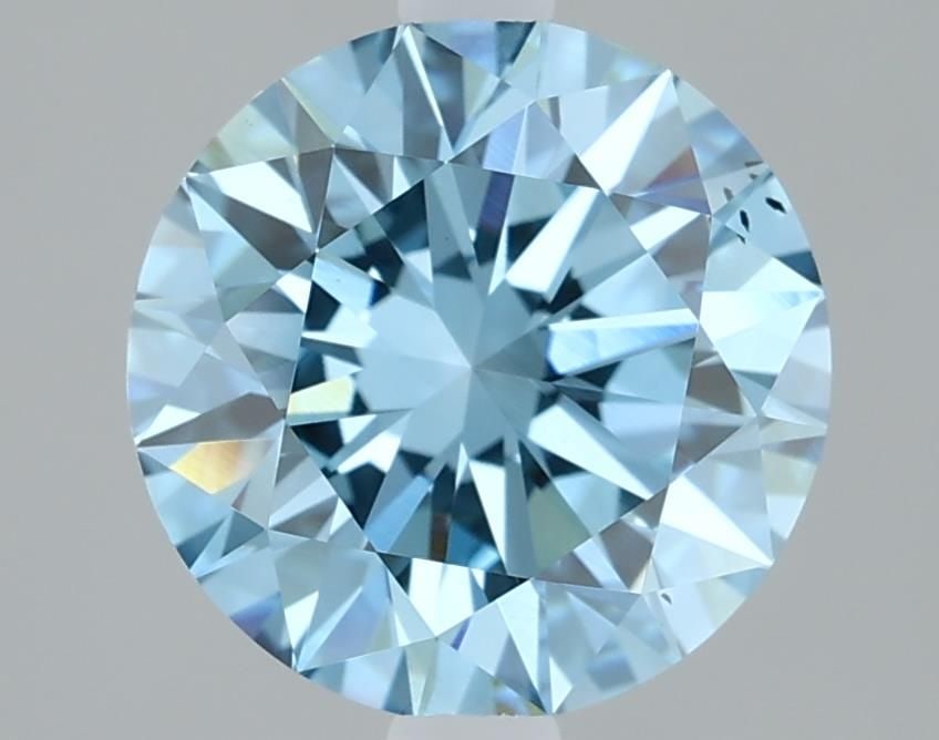 Loose Diamond - ROUND 2.12ct Fancy Vivid Blue VS2: Loose Diamond - ROUND 2.12ct Fancy Vivid Blue VS2 Source: This is a real non-mined Diamond that has been grown in a lab Shape: ROUND Carats: 2.12 Color: Fancy Vivid Blue Certification: IGI Video:
