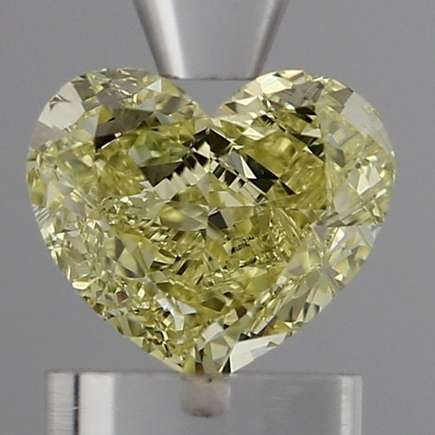 Loose Diamond - HEART 1.05ct Fancy Intense Yellow VS2: Loose Diamond - HEART 1.05ct Fancy Intense Yellow VS2 Source: This is a real non-mined Diamond that has been grown in a lab Shape: HEART Carats: 1.05 Color: Fancy Intense Yellow Certification: IGI Vid