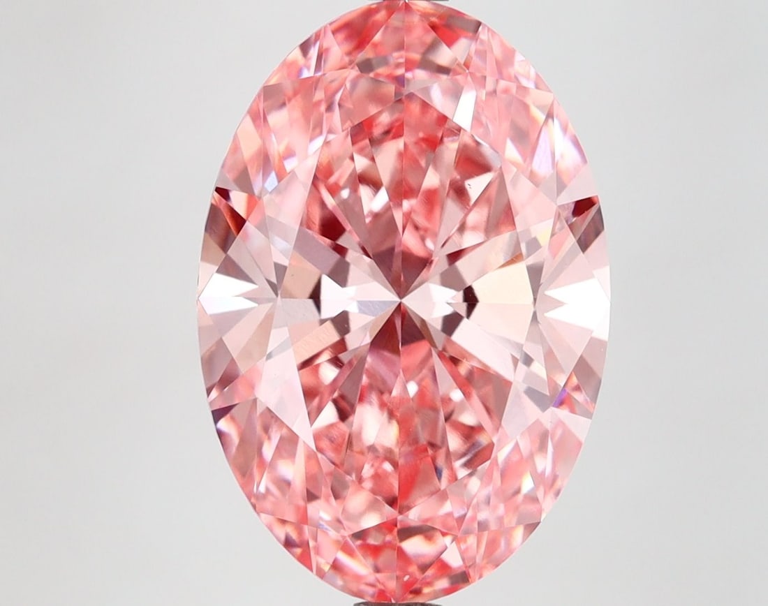 Loose Diamond - OVAL 5.79ct Fancy Vivid Pink VS2: Loose Diamond - OVAL 5.79ct Fancy Vivid Pink VS2 Source: This is a real non-mined Diamond that has been grown in a lab Shape: OVAL Carats: 5.79 Color: Fancy Vivid Pink Certification: IGI Video: