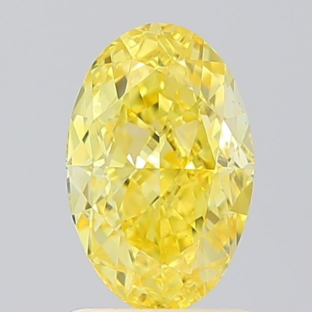 Loose Diamond - OVAL 1.5ct Fancy Vivid Yellow VS1: Loose Diamond - OVAL 1.5ct Fancy Vivid Yellow VS1 Source: This is a real non-mined Diamond that has been grown in a lab Shape: OVAL Carats: 1.5 Color: Fancy Vivid Yellow Certification: IGI Video:
