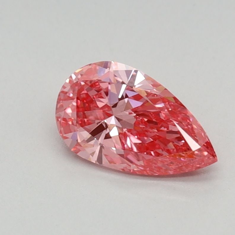 Loose Diamond - PEAR 0.45ct Fancy Vivid Pink VVS2: Loose Diamond - PEAR 0.45ct Fancy Vivid Pink VVS2 Source: This is a real non-mined Diamond that has been grown in a lab Shape: PEAR Carats: 0.45 Color: Fancy Vivid Pink Certification: IGI Video: