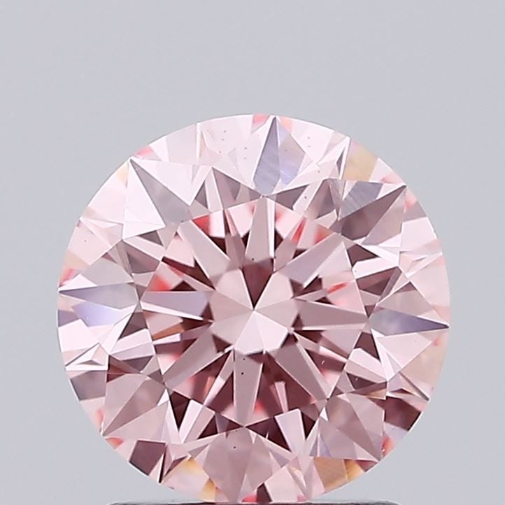 Ideal Loose Diamond - ROUND 1.68ct Fancy Vivid Pink VS2: Ideal Loose Diamond - ROUND 1.68ct Fancy Vivid Pink VS2 Source: This is a real non-mined Diamond that has been grown in a lab Shape: ROUND Carats: 1.68 Color: Fancy Vivid Pink Certification: IGI Video