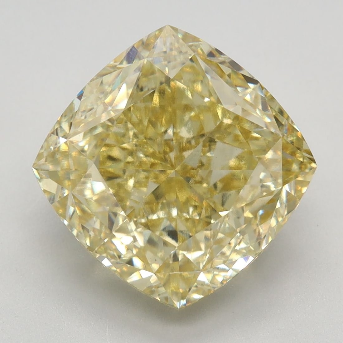 Loose Diamond - CUSHION MODIFIED 6.14ct Fancy Intense Yellow VVS2: Loose Diamond - CUSHION MODIFIED 6.14ct Fancy Intense Yellow VVS2 Source: This is a real non-mined Diamond that has been grown in a lab Shape: CUSHION MODIFIED Carats: 6.14 Color: Fancy Intense Yellow