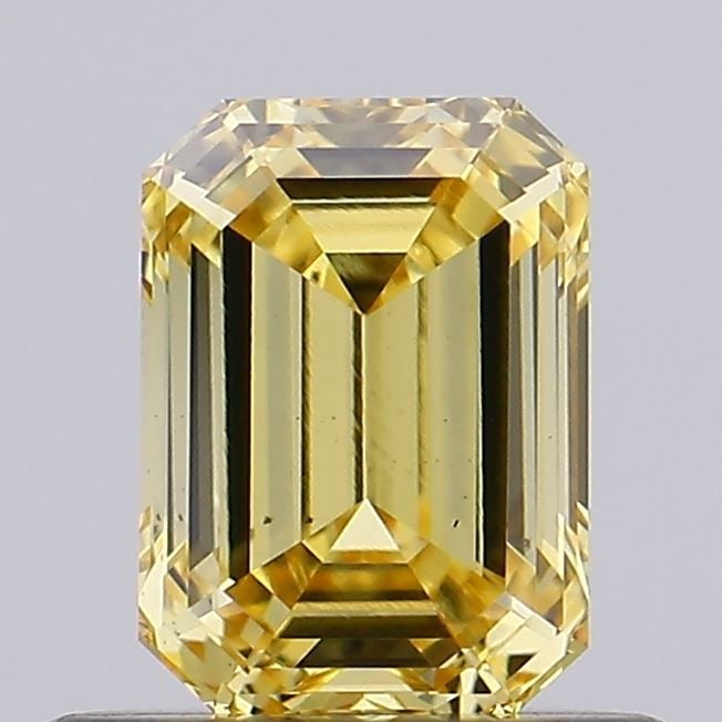 Loose Diamond - EMERALD 0.67ct Fancy Vivid Brownish Yellow VS2: Loose Diamond - EMERALD 0.67ct Fancy Vivid Brownish Yellow VS2 Source: This is a real non-mined Diamond that has been grown in a lab Shape: EMERALD Carats: 0.67 Color: Fancy Vivid Brownish Yellow Cert