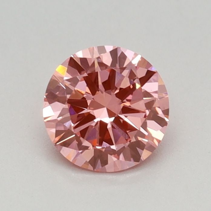 Loose Diamond - ROUND 0.44ct Fancy Vivid Pink VS1: Loose Diamond - ROUND 0.44ct Fancy Vivid Pink VS1 Source: This is a real non-mined Diamond that has been grown in a lab Shape: ROUND Carats: 0.44 Color: Fancy Vivid Pink Certification: IGI Video: