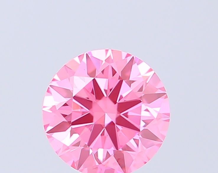 Ideal Loose Diamond - ROUND 0.53ct Fancy Vivid Pink VS1: Ideal Loose Diamond - ROUND 0.53ct Fancy Vivid Pink VS1 Source: This is a real non-mined Diamond that has been grown in a lab Shape: ROUND Carats: 0.53 Color: Fancy Vivid Pink Certification: IGI Video