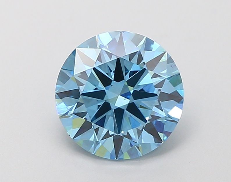 Ideal Loose Diamond - ROUND 2.06ct Fancy Vivid Blue VS2: Ideal Loose Diamond - ROUND 2.06ct Fancy Vivid Blue VS2 Source: This is a real non-mined Diamond that has been grown in a lab Shape: ROUND Carats: 2.06 Color: Fancy Vivid Blue Certification: IGI Video