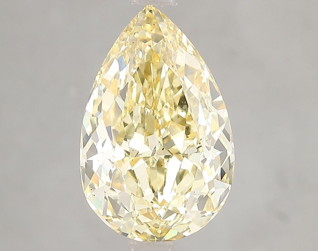 Loose Diamond - PEAR 4.52ct Fancy Yellow VS2: Loose Diamond - PEAR 4.52ct Fancy Yellow VS2 Source: This is a real non-mined Diamond that has been grown in a lab Shape: PEAR Carats: 4.52 Color: Fancy Yellow Certification: IGI Video: