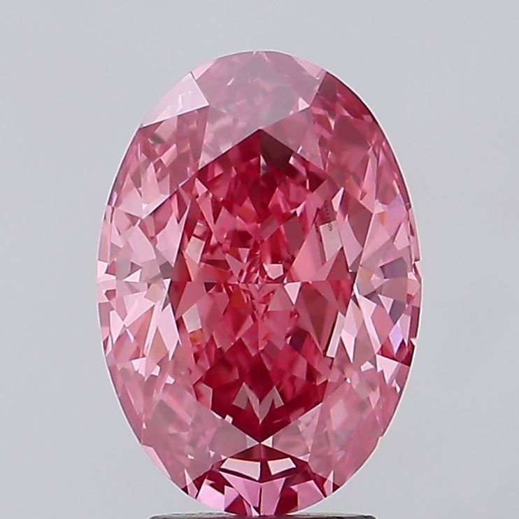 Loose Diamond - OVAL 4.12ct Fancy Vivid Pink VVS2: Loose Diamond - OVAL 4.12ct Fancy Vivid Pink VVS2 Source: This is a real non-mined Diamond that has been grown in a lab Shape: OVAL Carats: 4.12 Color: Fancy Vivid Pink Certification: IGI Video: