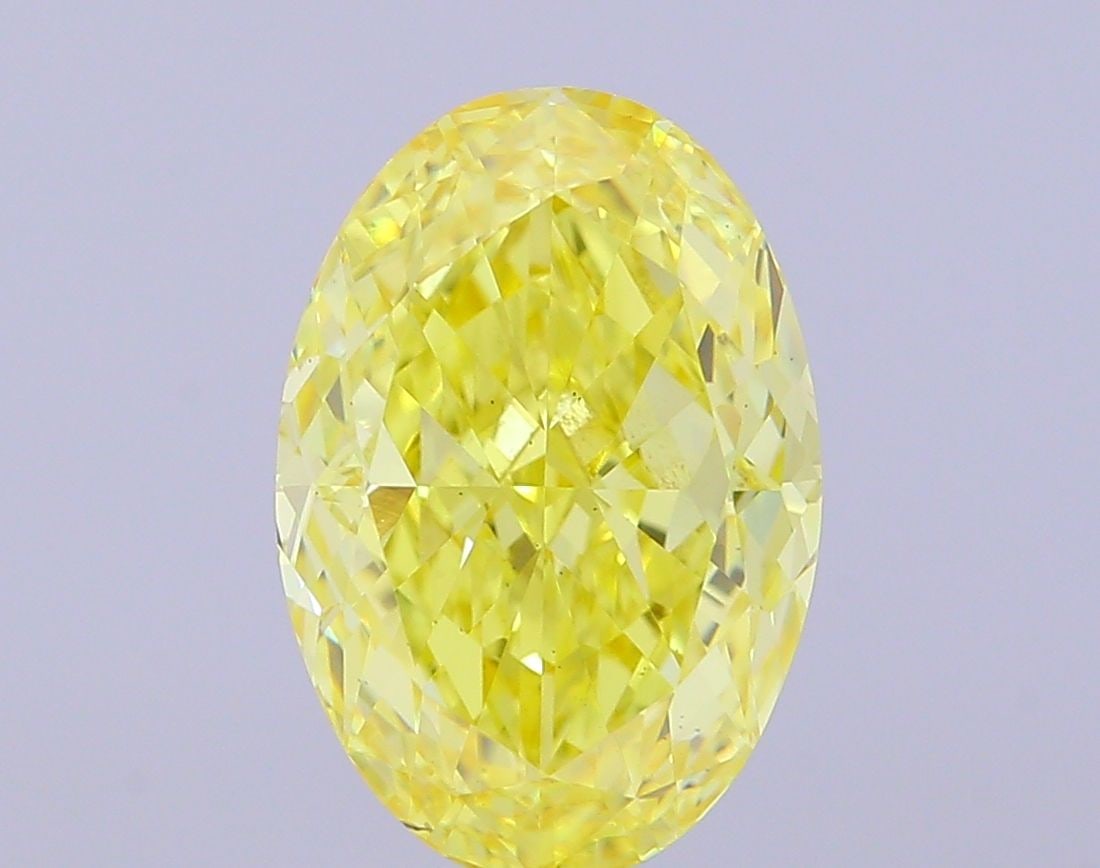 Loose Diamond - OVAL 5.04ct Fancy Vivid Yellow VS2: Loose Diamond - OVAL 5.04ct Fancy Vivid Yellow VS2 Source: This is a real non-mined Diamond that has been grown in a lab Shape: OVAL Carats: 5.04 Color: Fancy Vivid Yellow Certification: IGI Video: