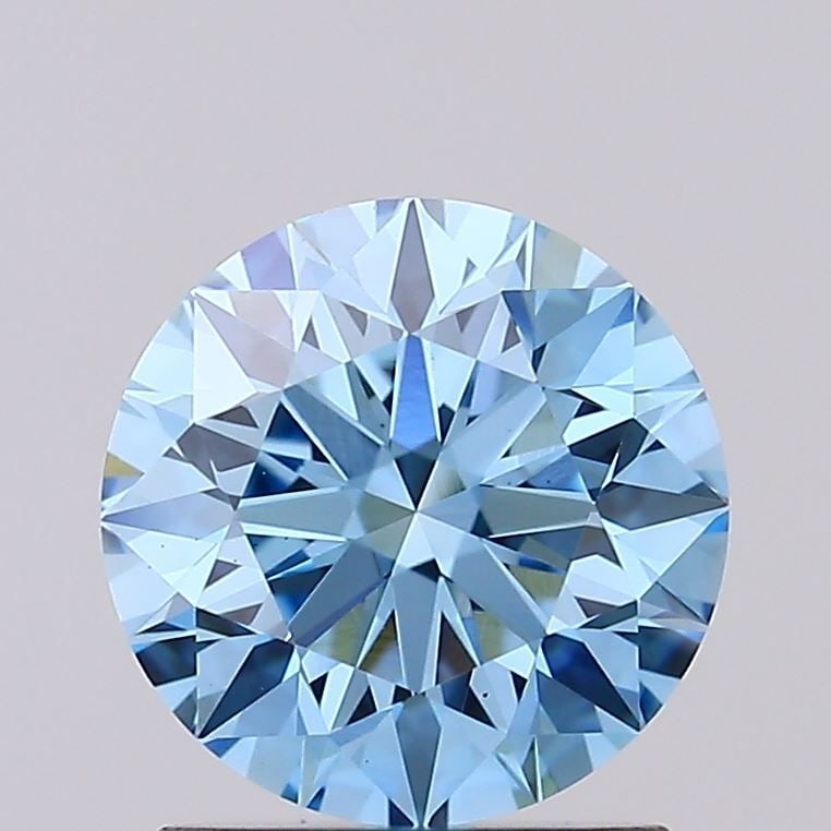 Loose Diamond - ROUND 1.39ct Fancy Vivid Blue VS1: Loose Diamond - ROUND 1.39ct Fancy Vivid Blue VS1 Source: This is a real non-mined Diamond that has been grown in a lab Shape: ROUND Carats: 1.39 Color: Fancy Vivid Blue Certification: IGI Video:
