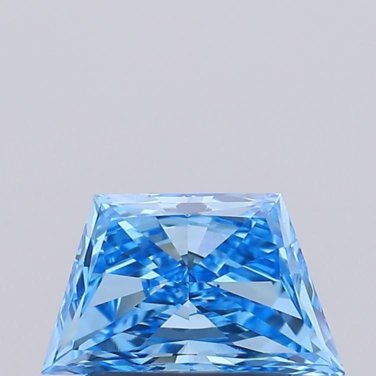Loose Diamond - TRAPEZOID 0.99ct Fancy Vivid Blue VS1: Loose Diamond - TRAPEZOID 0.99ct Fancy Vivid Blue VS1 Source: This is a real non-mined Diamond that has been grown in a lab Shape: TRAPEZOID Carats: 0.99 Color: Fancy Vivid Blue Certification: IGI Vid