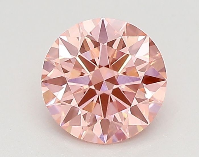 Ideal Loose Diamond - ROUND 0.68ct Fancy Vivid Pink VVS2: Ideal Loose Diamond - ROUND 0.68ct Fancy Vivid Pink VVS2 Source: This is a real non-mined Diamond that has been grown in a lab Shape: ROUND Carats: 0.68 Color: Fancy Vivid Pink Certification: IGI Vide