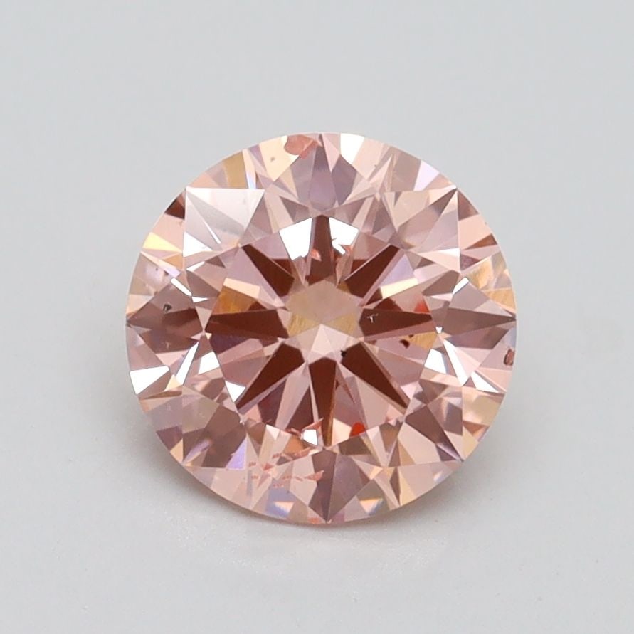 Loose Diamond - ROUND 1.5ct Fancy Intense Pink SI1: Loose Diamond - ROUND 1.5ct Fancy Intense Pink SI1 Source: This is a real non-mined Diamond that has been grown in a lab Shape: ROUND Carats: 1.5 Color: Fancy Intense Pink Certification: IGI Video: