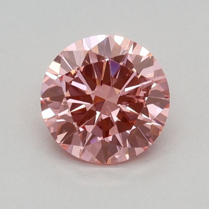 Loose Diamond - ROUND 0.34ct Fancy Vivid Pink VVS2: Loose Diamond - ROUND 0.34ct Fancy Vivid Pink VVS2 Source: This is a real non-mined Diamond that has been grown in a lab Shape: ROUND Carats: 0.34 Color: Fancy Vivid Pink Certification: IGI Video: