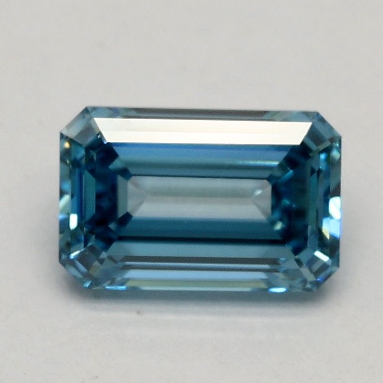 Loose Diamond - EMERALD 0.93ct Fancy Vivid Blue VS2: Loose Diamond - EMERALD 0.93ct Fancy Vivid Blue VS2 Source: This is a real non-mined Diamond that has been grown in a lab Shape: EMERALD Carats: 0.93 Color: Fancy Vivid Blue Certification: IGI Video: