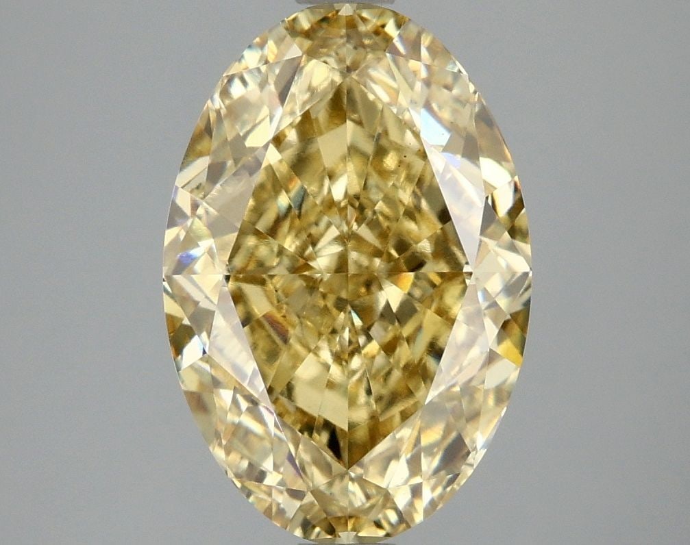 Loose Diamond - OVAL 4.06ct Fancy Intense Yellow VS1: Loose Diamond - OVAL 4.06ct Fancy Intense Yellow VS1 Source: This is a real non-mined Diamond that has been grown in a lab Shape: OVAL Carats: 4.06 Color: Fancy Intense Yellow Certification: IGI Video