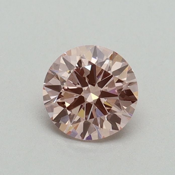 Loose Diamond - ROUND 0.5ct Fancy Intense Pink VS2: Loose Diamond - ROUND 0.5ct Fancy Intense Pink VS2 Source: This is a real non-mined Diamond that has been grown in a lab Shape: ROUND Carats: 0.5 Color: Fancy Intense Pink Certification: IGI Video: