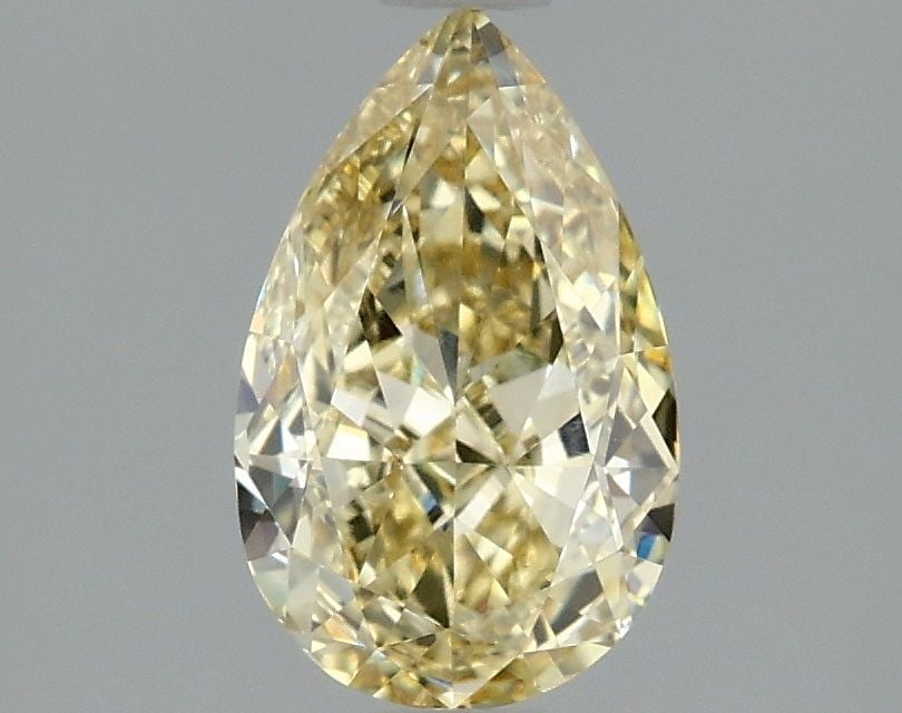 Loose Diamond - PEAR 1.53ct Fancy Yellow VVS2: Loose Diamond - PEAR 1.53ct Fancy Yellow VVS2 Source: This is a real non-mined Diamond that has been grown in a lab Shape: PEAR Carats: 1.53 Color: Fancy Yellow Certification: IGI Video: