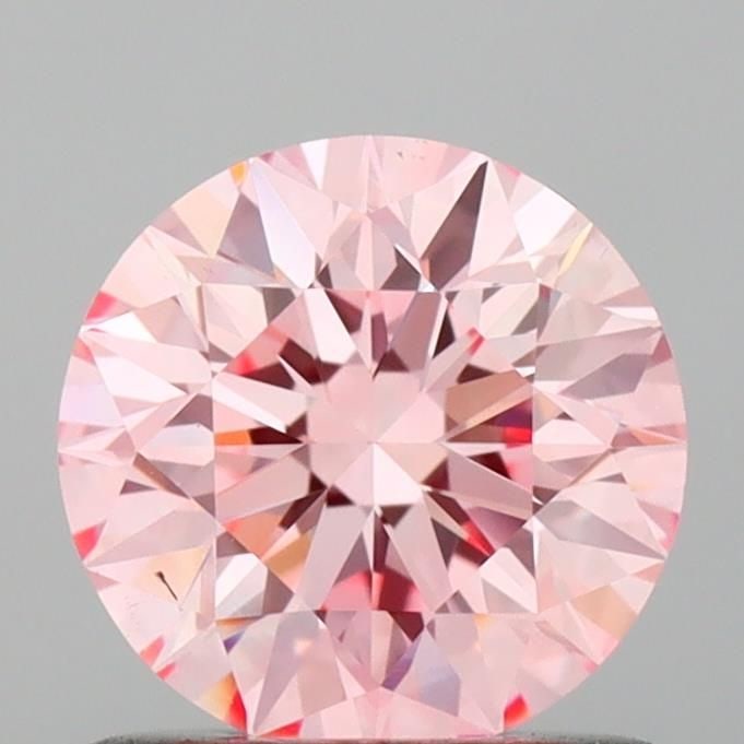 Loose Diamond - ROUND 0.91ct Fancy Vivid Pink VS1: Loose Diamond - ROUND 0.91ct Fancy Vivid Pink VS1 Source: This is a real non-mined Diamond that has been grown in a lab Shape: ROUND Carats: 0.91 Color: Fancy Vivid Pink Certification: IGI Video: