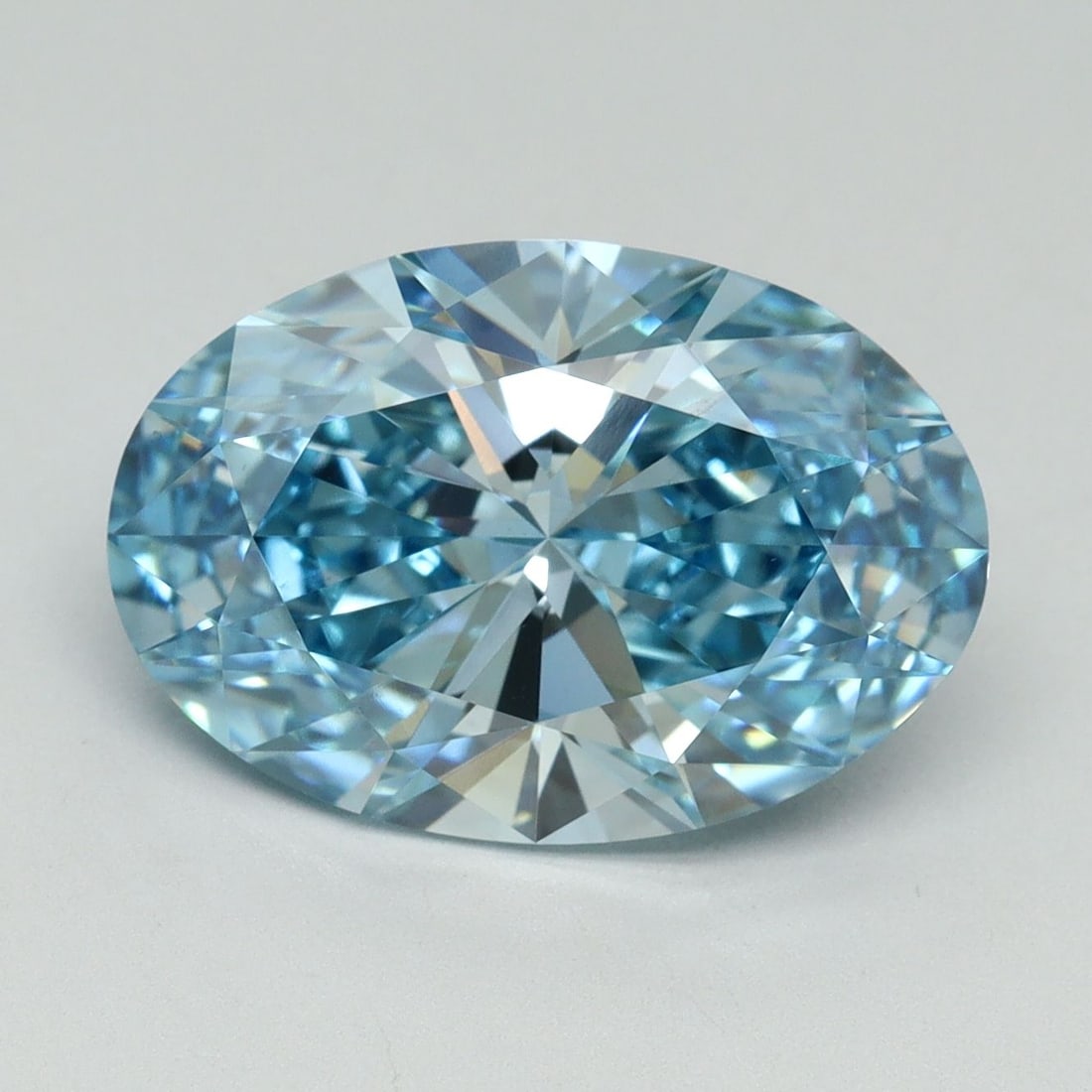 Loose Diamond - OVAL 5.14ct Fancy Vivid Blue VS1: Loose Diamond - OVAL 5.14ct Fancy Vivid Blue VS1 Source: This is a real non-mined Diamond that has been grown in a lab Shape: OVAL Carats: 5.14 Color: Fancy Vivid Blue Certification: IGI Video: