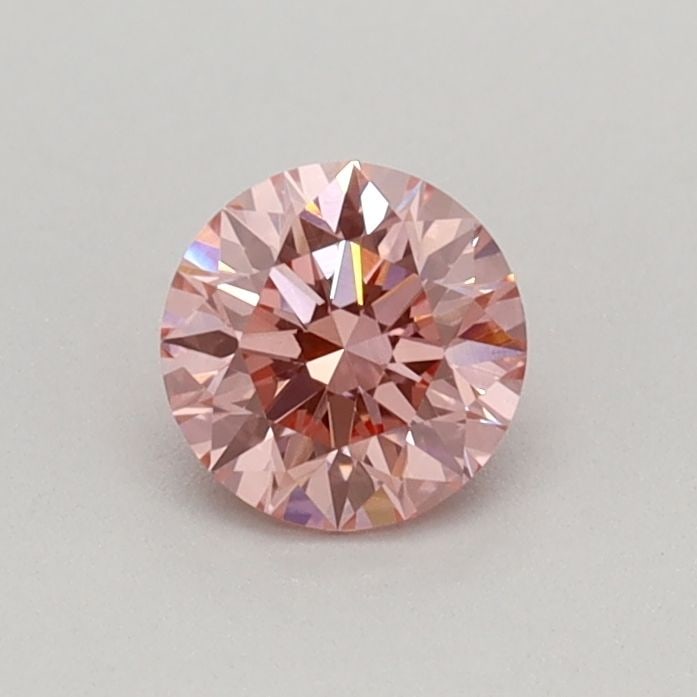 Loose Diamond - ROUND 0.33ct Fancy Vivid Pink VVS2: Loose Diamond - ROUND 0.33ct Fancy Vivid Pink VVS2 Source: This is a real non-mined Diamond that has been grown in a lab Shape: ROUND Carats: 0.33 Color: Fancy Vivid Pink Certification: IGI Video:
