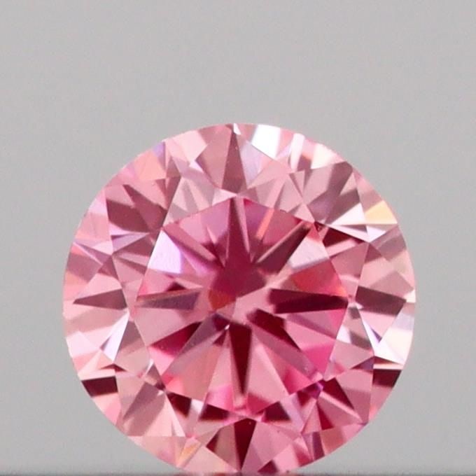 Loose Diamond - ROUND 0.13ct Fancy Vivid Pink VS1: Loose Diamond - ROUND 0.13ct Fancy Vivid Pink VS1 Source: This is a real non-mined Diamond that has been grown in a lab Shape: ROUND Carats: 0.13 Color: Fancy Vivid Pink Certification: IGI Video:
