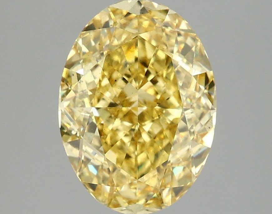 Loose Diamond - OVAL 3.07ct Fancy Vivid Yellow VS2: Loose Diamond - OVAL 3.07ct Fancy Vivid Yellow VS2 Source: This is a real non-mined Diamond that has been grown in a lab Shape: OVAL Carats: 3.07 Color: Fancy Vivid Yellow Certification: IGI Video: