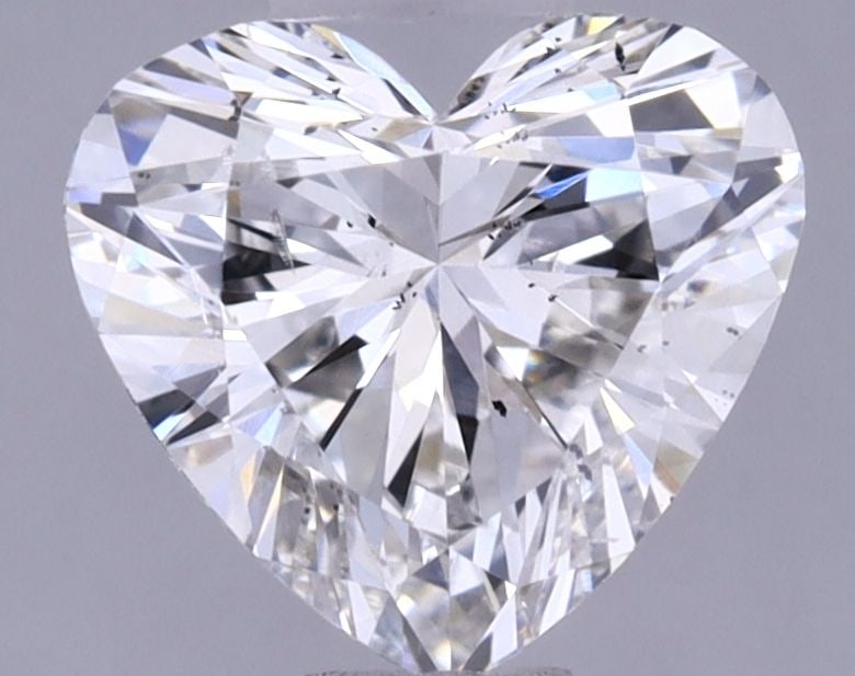 Loose Diamond - HEART 0.7ct G SI1: Loose Diamond - HEART 0.7ct G SI1 Source: This is a real non-mined Diamond that has been grown in a lab Shape: HEART Carats: 0.7 Color: G Clarity: SI1 Certification: IGI Video: