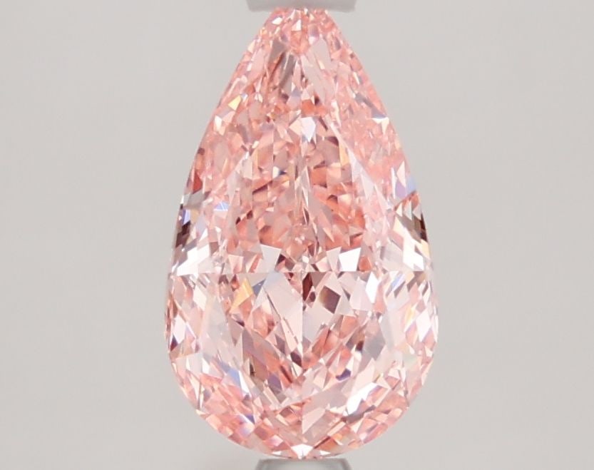 Loose Diamond - PEAR 1.62ct Fancy Vivid Pink VS1: Loose Diamond - PEAR 1.62ct Fancy Vivid Pink VS1 Source: This is a real non-mined Diamond that has been grown in a lab Shape: PEAR Carats: 1.62 Color: Fancy Vivid Pink Certification: IGI Video:
