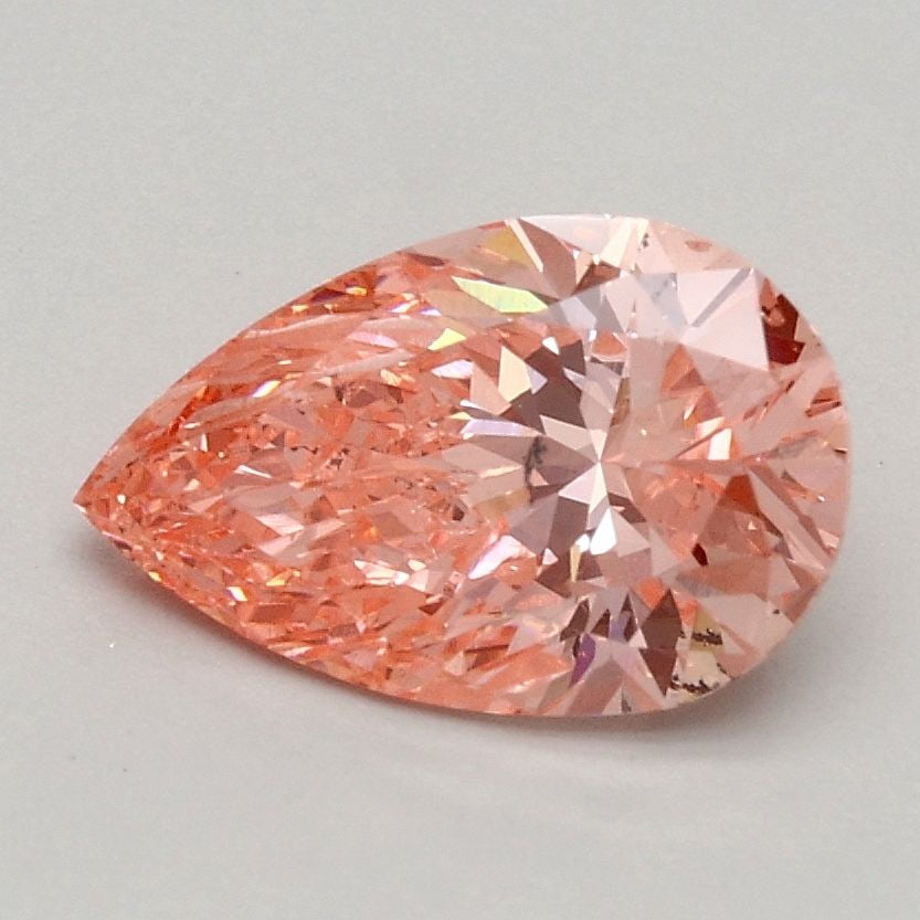 Loose Diamond - PEAR 1.01ct Fancy Vivid Pink SI2: Loose Diamond - PEAR 1.01ct Fancy Vivid Pink SI2 Source: This is a real non-mined Diamond that has been grown in a lab Shape: PEAR Carats: 1.01 Color: Fancy Vivid Pink Certification: IGI Video: