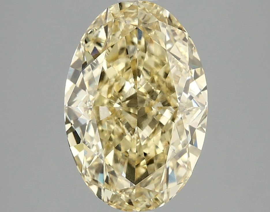 Loose Diamond - OVAL 3.08ct Fancy Vivid Yellow VS2: Loose Diamond - OVAL 3.08ct Fancy Vivid Yellow VS2 Source: This is a real non-mined Diamond that has been grown in a lab Shape: OVAL Carats: 3.08 Color: Fancy Vivid Yellow Certification: IGI Video: