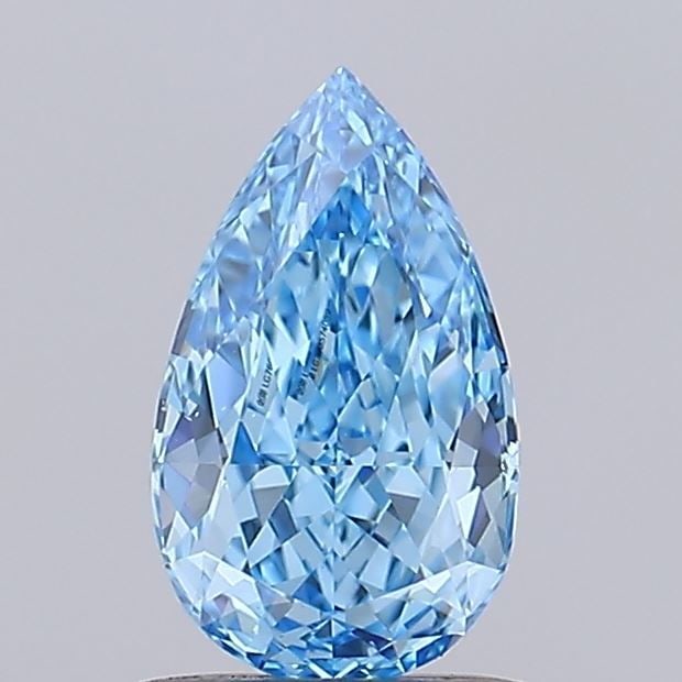 Loose Diamond - PEAR 0.93ct Fancy Vivid Blue VS1: Loose Diamond - PEAR 0.93ct Fancy Vivid Blue VS1 Source: This is a real non-mined Diamond that has been grown in a lab Shape: PEAR Carats: 0.93 Color: Fancy Vivid Blue Certification: IGI Video: