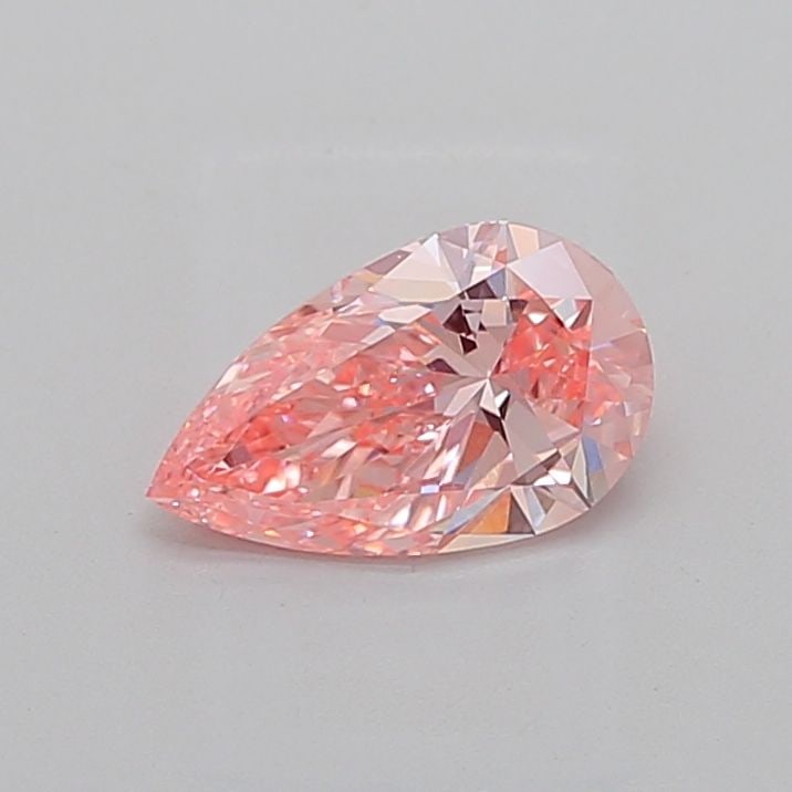 Loose Diamond - PEAR 1.5ct Fancy Vivid Pink VVS2: Loose Diamond - PEAR 1.5ct Fancy Vivid Pink VVS2 Source: This is a real non-mined Diamond that has been grown in a lab Shape: PEAR Carats: 1.5 Color: Fancy Vivid Pink Certification: IGI Video: