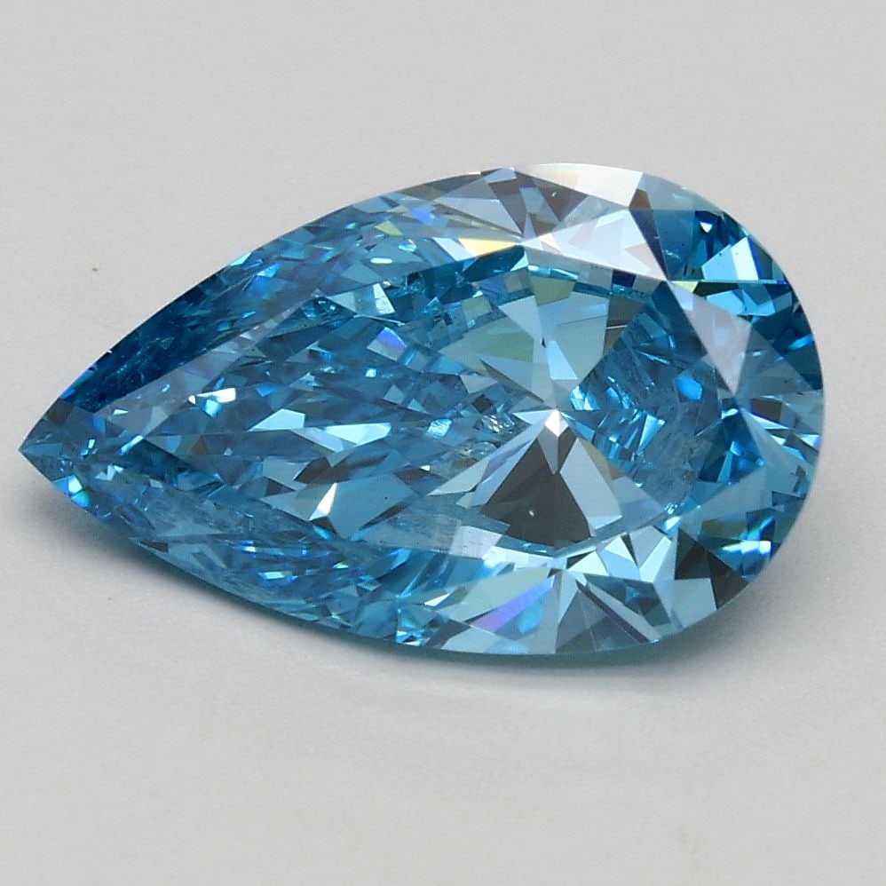 Loose Diamond - PEAR 1.8ct Fancy Vivid Blue VS2: Loose Diamond - PEAR 1.8ct Fancy Vivid Blue VS2 Source: This is a real non-mined Diamond that has been grown in a lab Shape: PEAR Carats: 1.8 Color: Fancy Vivid Blue Certification: IGI Video: