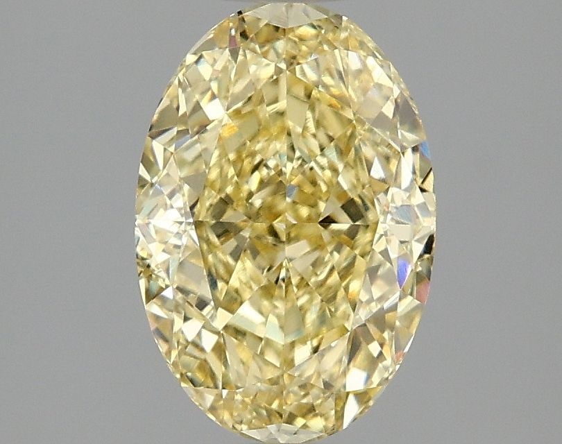 Loose Diamond - OVAL 2.09ct Fancy Intense Yellow VVS2: Loose Diamond - OVAL 2.09ct Fancy Intense Yellow VVS2 Source: This is a real non-mined Diamond that has been grown in a lab Shape: OVAL Carats: 2.09 Color: Fancy Intense Yellow Certification: IGI Vide