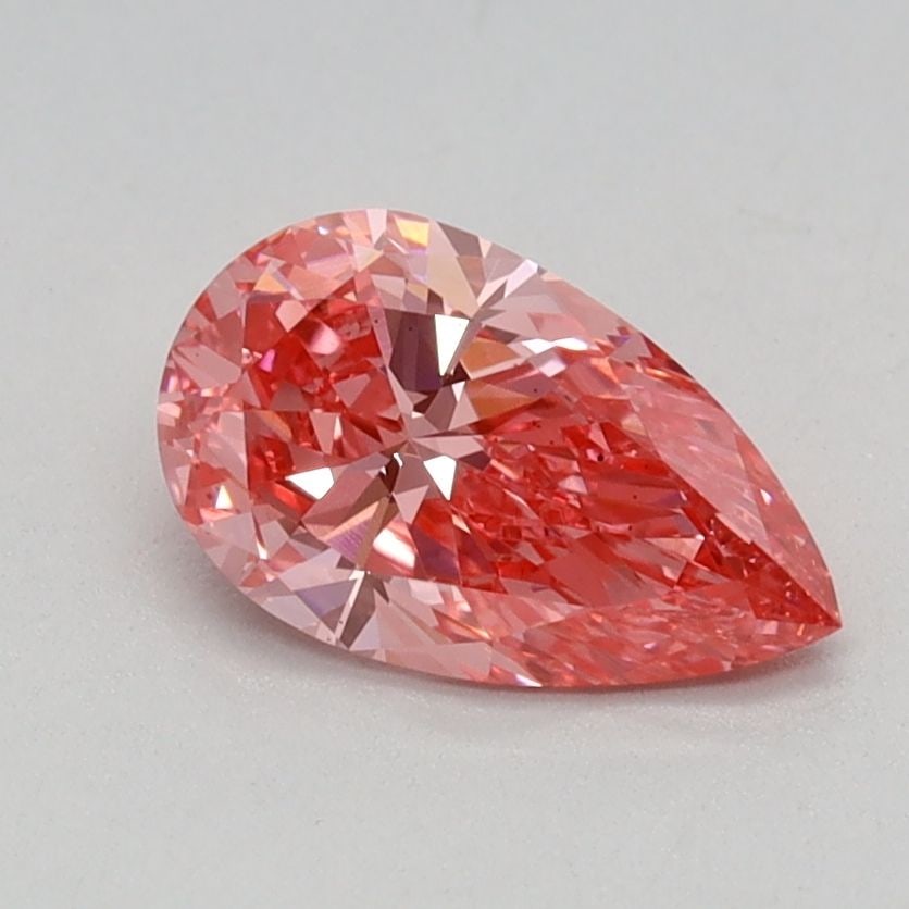 Loose Diamond - PEAR 0.66ct Fancy Vivid Pink VS2: Loose Diamond - PEAR 0.66ct Fancy Vivid Pink VS2 Source: This is a real non-mined Diamond that has been grown in a lab Shape: PEAR Carats: 0.66 Color: Fancy Vivid Pink Certification: IGI Video: