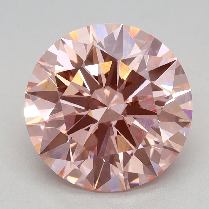 Ideal Loose Diamond - ROUND 2.1ct Fancy Vivid Pink VVS2: Ideal Loose Diamond - ROUND 2.1ct Fancy Vivid Pink VVS2 Source: This is a real non-mined Diamond that has been grown in a lab Shape: ROUND Carats: 2.1 Color: Fancy Vivid Pink Certification: IGI Video: