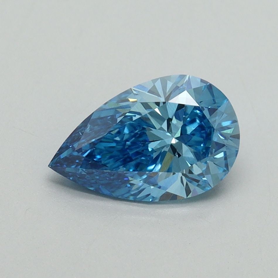 Loose Diamond - PEAR 1.06ct Fancy Vivid Blue VS1: Loose Diamond - PEAR 1.06ct Fancy Vivid Blue VS1 Source: This is a real non-mined Diamond that has been grown in a lab Shape: PEAR Carats: 1.06 Color: Fancy Vivid Blue Certification: IGI Video: