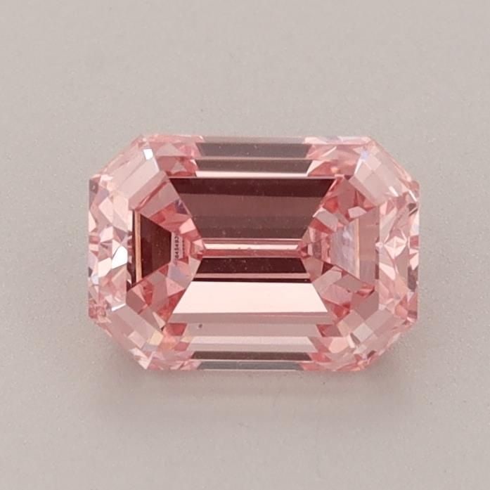 Loose Diamond - EMERALD 0.95ct Fancy Vivid Pink VS2: Loose Diamond - EMERALD 0.95ct Fancy Vivid Pink VS2 Source: This is a real non-mined Diamond that has been grown in a lab Shape: EMERALD Carats: 0.95 Color: Fancy Vivid Pink Certification: IGI Video: