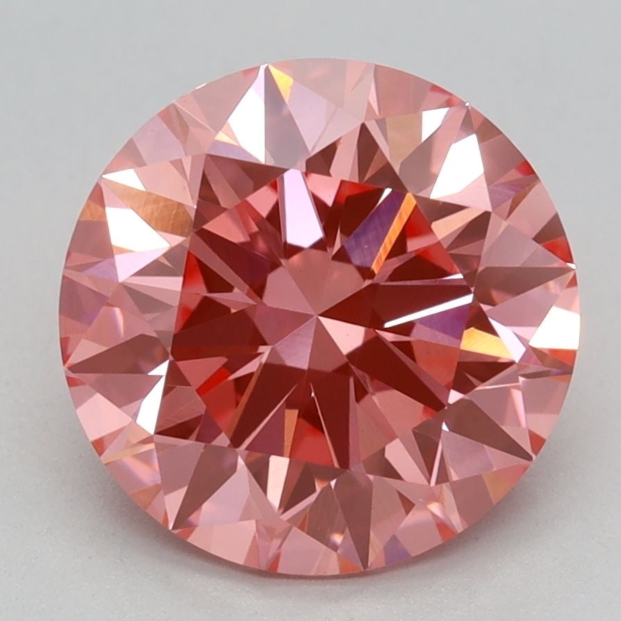 Ideal Loose Diamond - ROUND 2.59ct Fancy Vivid Pink VS1: Ideal Loose Diamond - ROUND 2.59ct Fancy Vivid Pink VS1 Source: This is a real non-mined Diamond that has been grown in a lab Shape: ROUND Carats: 2.59 Color: Fancy Vivid Pink Certification: IGI Video
