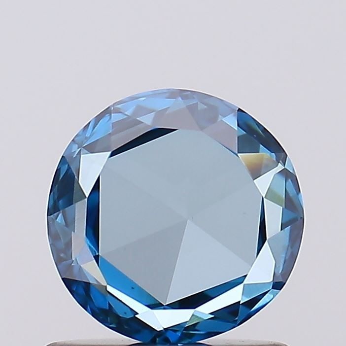 Loose Diamond - ROSE 0.74ct Fancy Vivid Blue VS1: Loose Diamond - ROSE 0.74ct Fancy Vivid Blue VS1 Source: This is a real non-mined Diamond that has been grown in a lab Shape: ROSE Carats: 0.74 Color: Fancy Vivid Blue Certification: NONE Video: