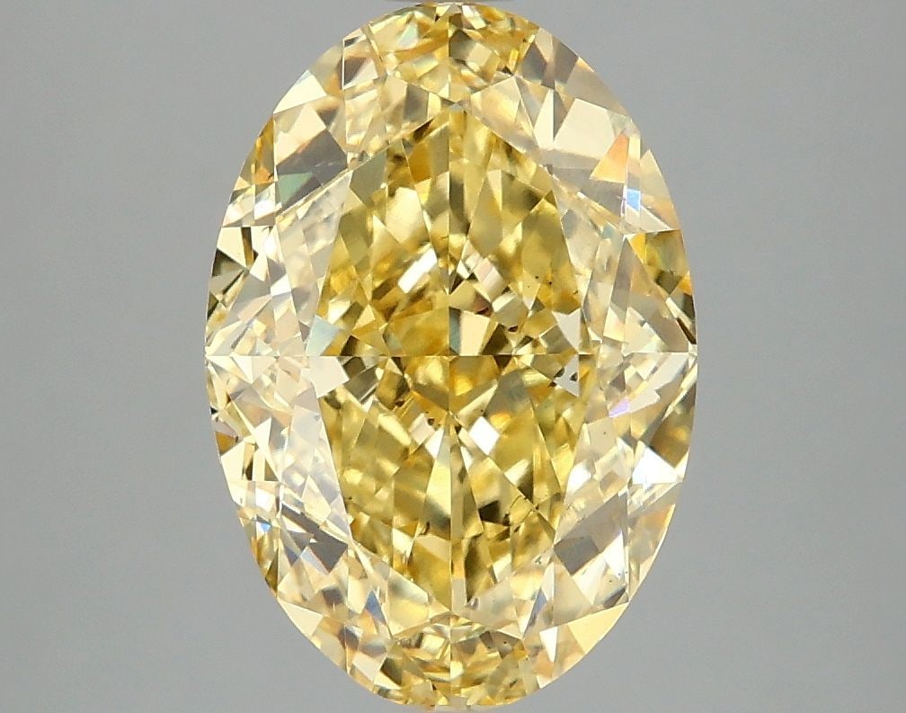 Loose Diamond - OVAL 4.1ct Fancy Vivid Yellow SI1: Loose Diamond - OVAL 4.1ct Fancy Vivid Yellow SI1 Source: This is a real non-mined Diamond that has been grown in a lab Shape: OVAL Carats: 4.1 Color: Fancy Vivid Yellow Certification: IGI Video: