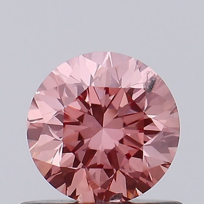 Loose Diamond - ROUND 0.7ct Fancy Intense Brownish Pink SI2: Loose Diamond - ROUND 0.7ct Fancy Intense Brownish Pink SI2 Source: This is a real non-mined Diamond that has been grown in a lab Shape: ROUND Carats: 0.7 Color: Fancy Intense Brownish Pink Certificat