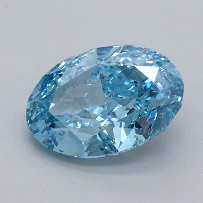 Loose Diamond - OVAL 1.04ct Fancy Vivid Blue VVS2: Loose Diamond - OVAL 1.04ct Fancy Vivid Blue VVS2 Source: This is a real non-mined Diamond that has been grown in a lab Shape: OVAL Carats: 1.04 Color: Fancy Vivid Blue Certification: IGI Video: